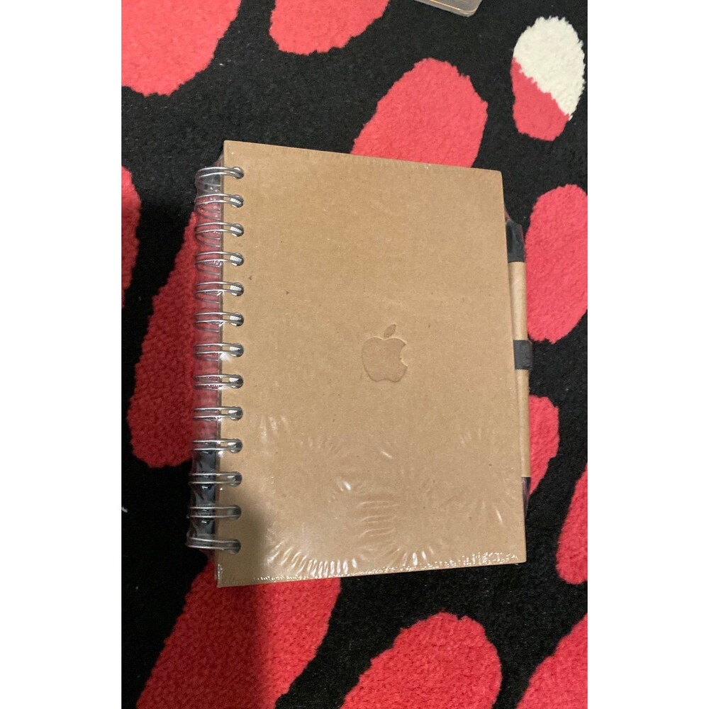 Apple Spirl notebook and pen